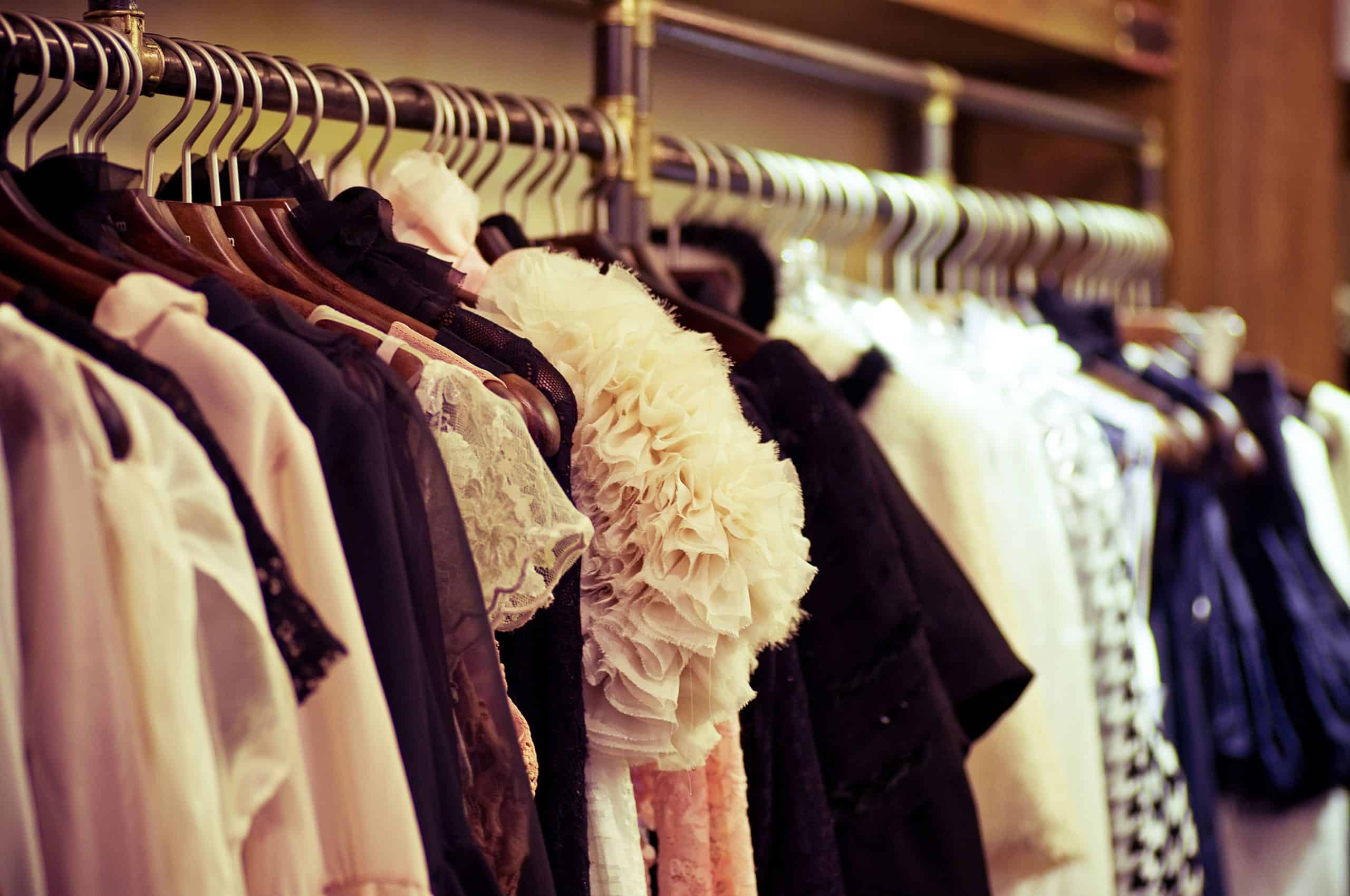 Clothes hanging in a closet.