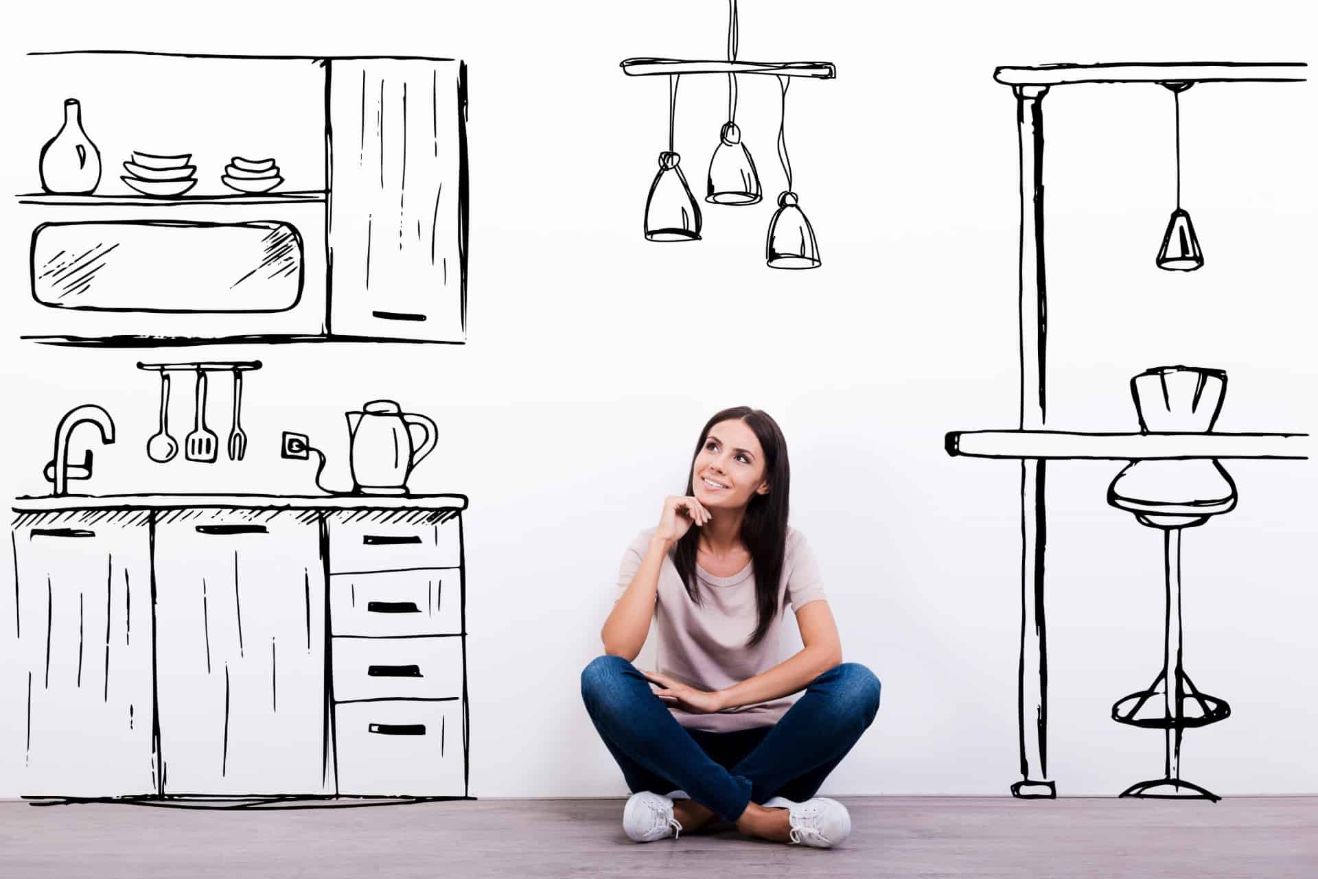 A woman dreaming of a home improvement project.